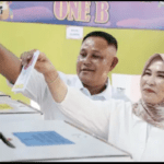 Nanang Ermanto dan Istri Nyoblos di TPS 001 Desa Way Galih, Pesan Jangan Golput