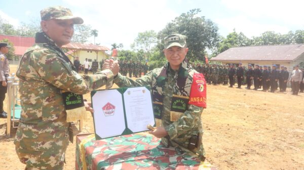 Bupati Sarolangun dan Dansatgas TMMD Ke-128 Kodim 0420/Sarko Tanda Tangani Nota Kesepakatan